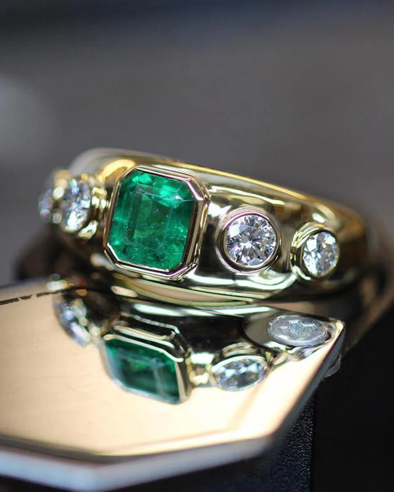 phillip-jennings-jewellery-bespoke-handmade-18ct-yellow-gold-bombe-ring-with-cushion-cut-green-emerald-and-four-roun